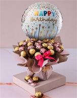 Ferrero And Pink Chocolate Star Arrangement offers at R 649,94 in Netflorist