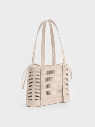 Delphi Cut-Out Bucket Bag  - oat offers at R 1250 in Charles & Keith